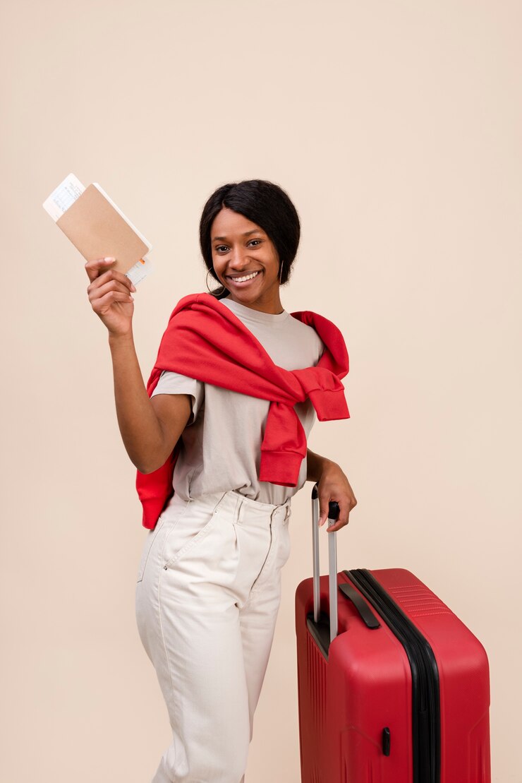 smiley-woman-with-red-baggage-medium-shot_23-2149380134