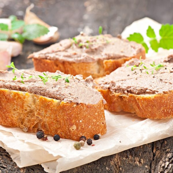 homemade-meat-snack-chicken-liver-pate-with-savory-olives_2829-11223